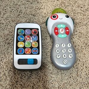 Fisher-Price baby’s first cell phone and Btoys remote control.